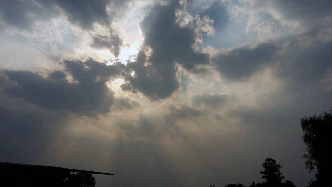 Beautiful sunbeams coming through the cloud-cover.