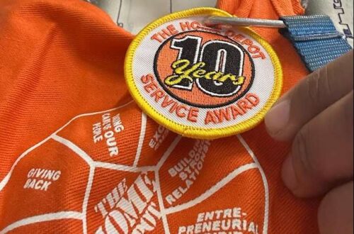 A Home Depo Employee shows their badge of "10 Years of Service!" What would the "Kingdom of God" Badge Say on our hearts - would it say "years of service?"