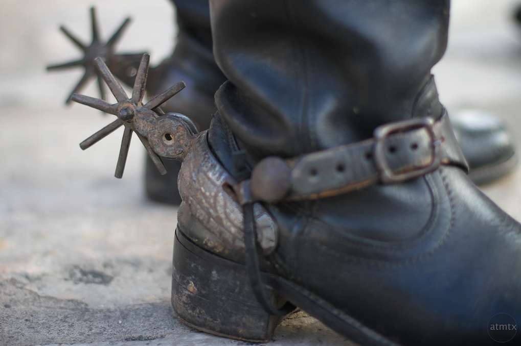 Close up of black boots and heel spurs for horseback riding. (Please visit atmtx's portfolio - they are an amazing photographer! https://www.atmtxphoto.com/Portfolio)